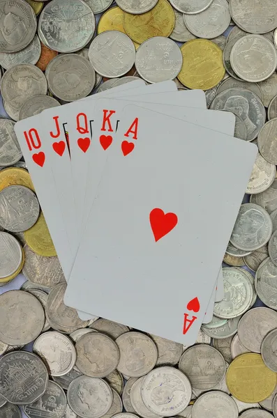 Poker kaart en munten — Stockfoto