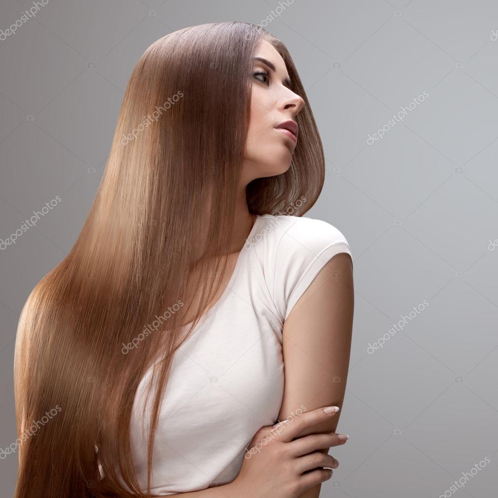 Long Hair. Beautiful Woman with Healthy Brown Hair. Stock Photo by ©puhhha  25846283