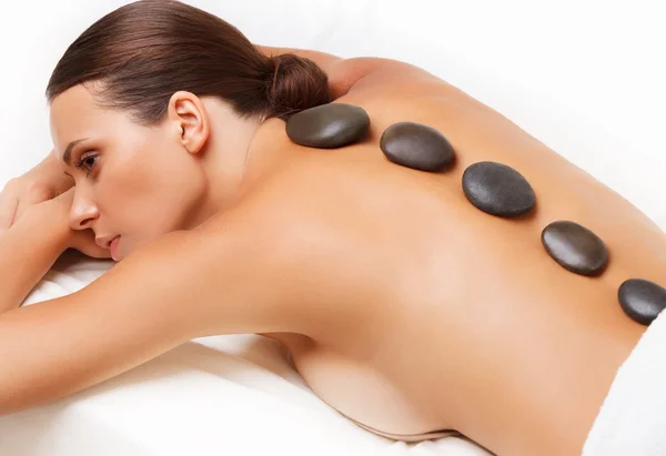 Stone Massage. Beautiful Woman Getting Spa Hot Stones Massage. S — Stock Photo, Image