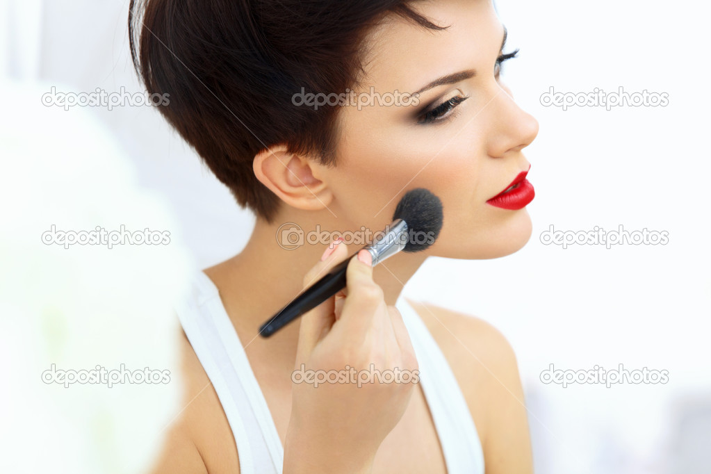 Girl with Makeup Brush and Red Lips