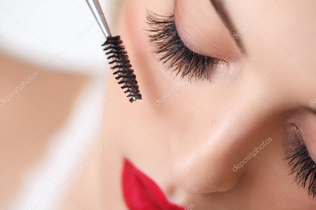 Woman with beautiful makeup and long eyelashes