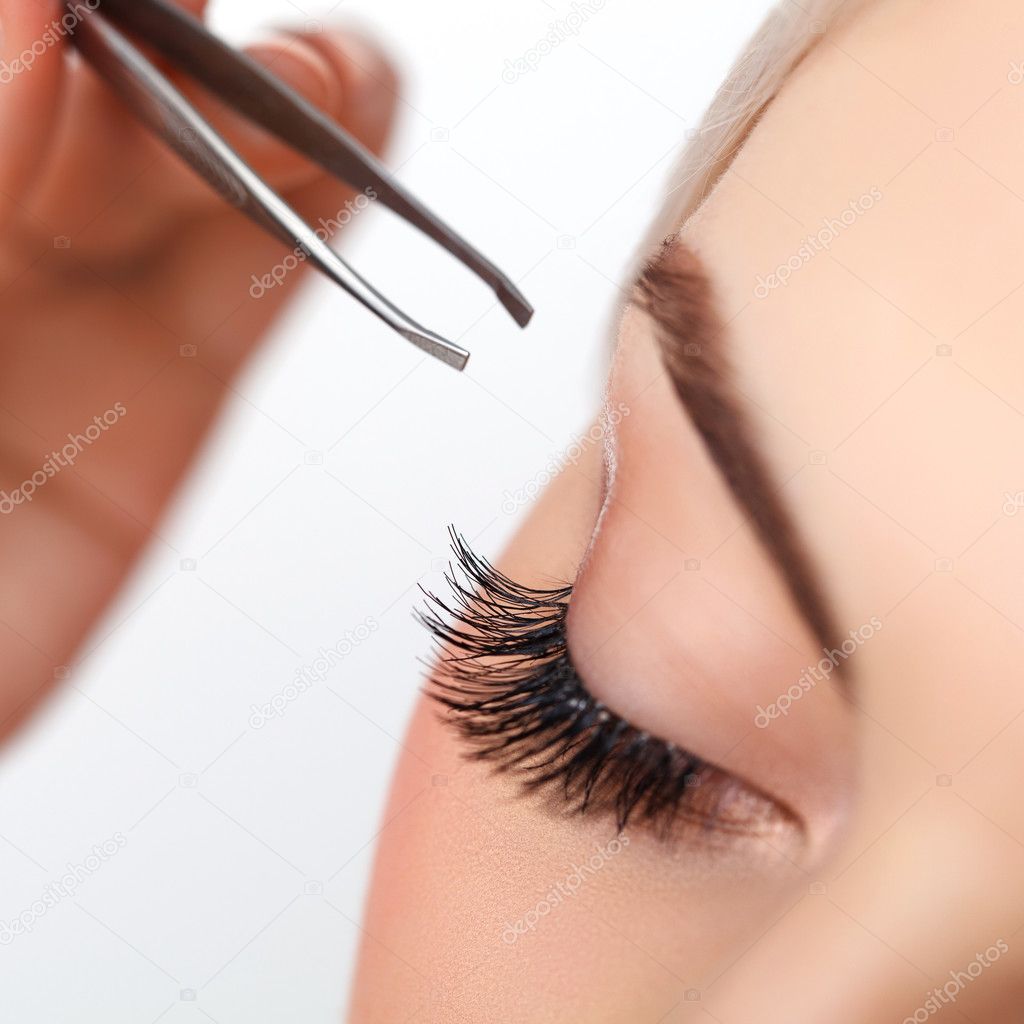 Woman eye with long eyelashes.