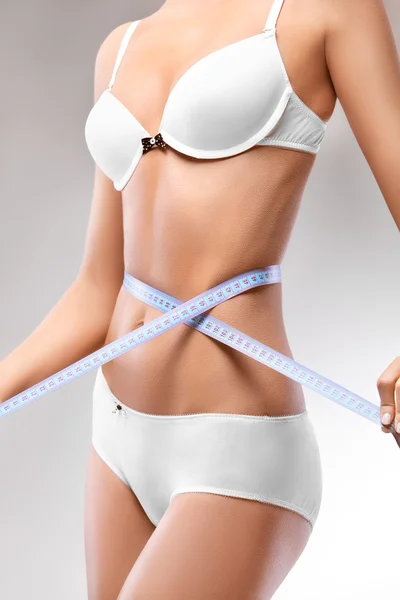 Slim Woman with Measure tape — Stock Photo, Image