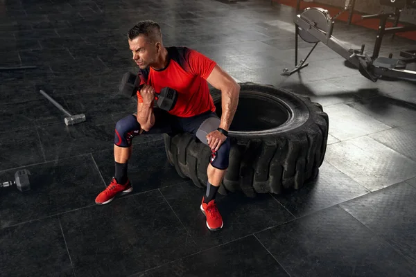 Man Sit Wheel Holding Lift Barbell Muscular Senior Athlete Training —  Fotos de Stock