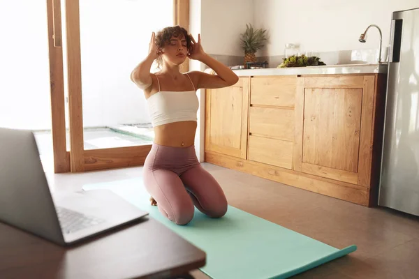 Yoga At Home. Woman In Easy Pose Warming Up Before Exercising. Young Female Sitting On Floor And Going To Practice. Sport Routine For Staying Calm