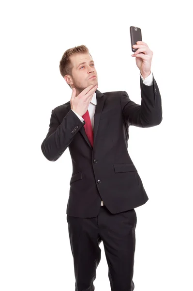 Businessman taking a selfie — Stock Photo, Image