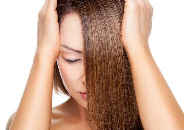 Beautiful woman with long elegant straight hair — Stock Photo, Image