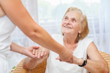 Providing care for elderly  clipart