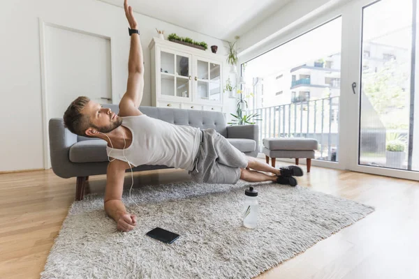 Handsome Young Man Working Out Home Living Room — Stock Photo, Image