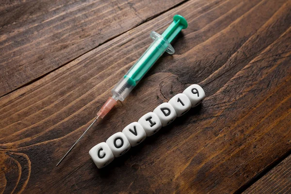Virusul Corona Covid Text Vaccin Fundal Din Lemn — Fotografie, imagine de stoc