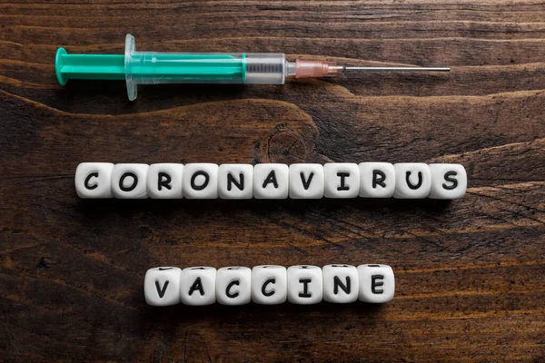Virusul Corona Covid Text Vaccin Fundal Din Lemn — Fotografie, imagine de stoc