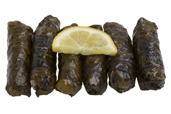 Stuffed grape leaves with olive oil — Stock Photo, Image