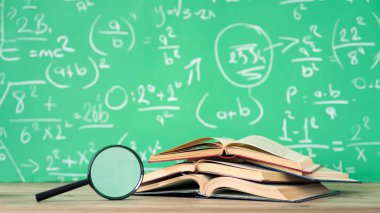 School books and pencils on desk, education concept