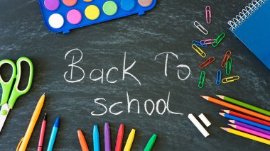 school stuff on the blackboard, education concept