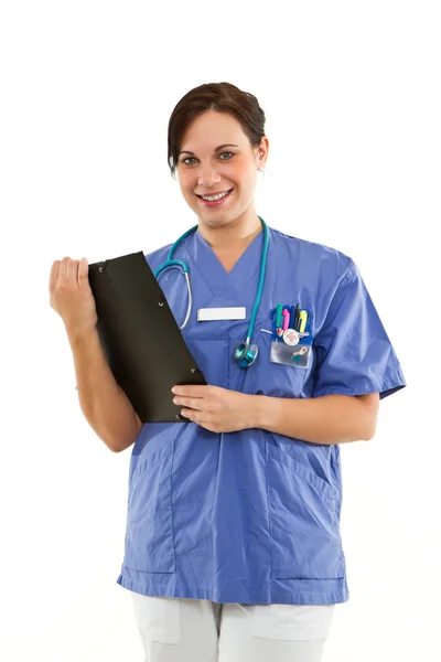 Kobieta lekarz uśmiechający się z noteboard — Zdjęcie stockowe