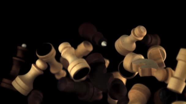 Super slow motion chess pieces take off and fall down.Filmed on a high-speed camera at 1000 fps. — Stock Video