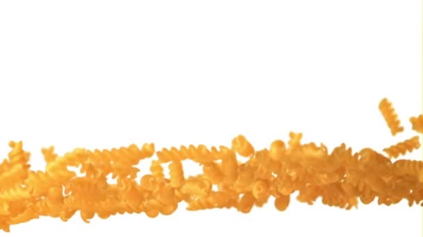 Super slow motion of the fusilli dry pasta drops. Filmed on a high-speed camera at 1000 fps. — Stock Video