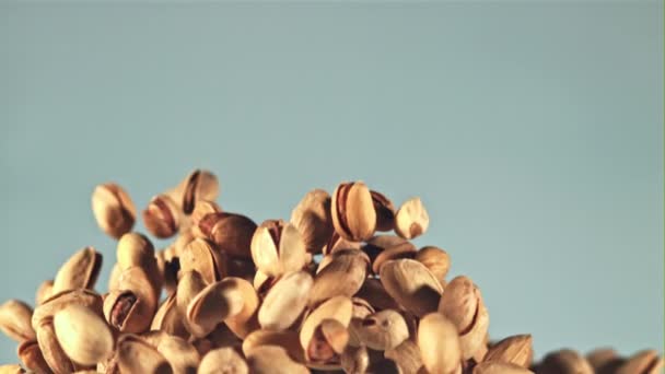Pistachios Fly Fall Blue Background Filmed High Speed Camera 1000 — Stock Video