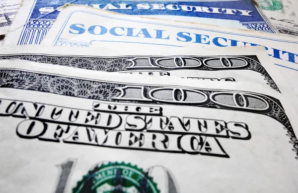 Social Security cards and money — Stock Photo, Image