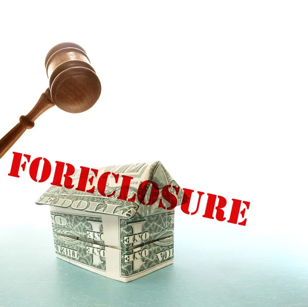 Dollar foreclosure house and gavel — Stock Photo, Image