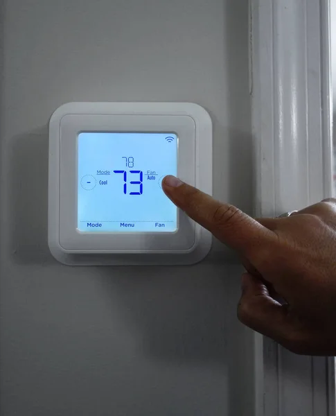 Person Adjusting Home Temperature Smart Thermostat — Zdjęcie stockowe