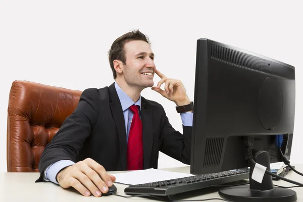 Gutaussehender Geschäftsmann lächelt positiv — Stockfoto