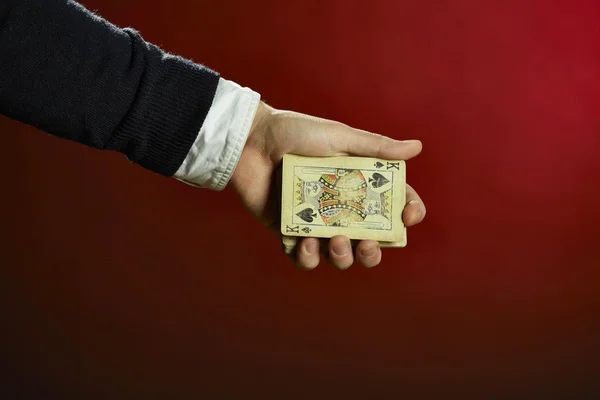 Hand holding playing cards — Stock Photo, Image