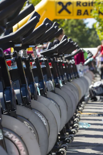 Stationary spinning bikes rows