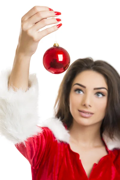 Young woman holding red Christmas ball — Stock Photo, Image