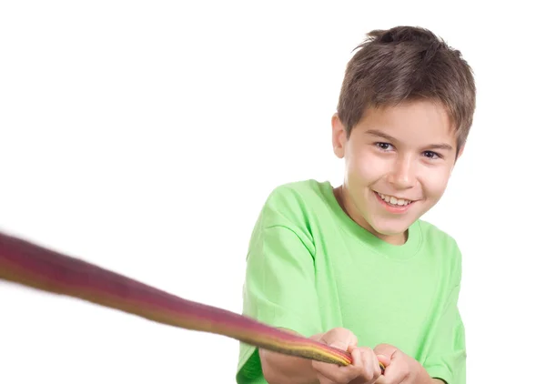 Boy pulling a rope — Stock Photo, Image