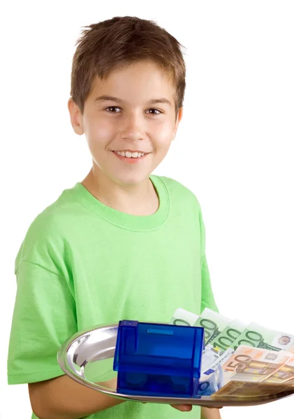 Happy boy with money and house on the tray — Stock Photo, Image