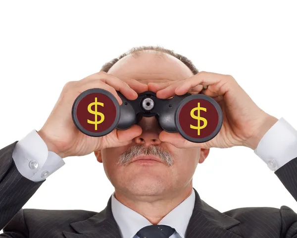 Businessman looking through binoculars — Stock Photo, Image