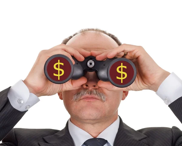 Dürbünle bakan bir iş adamı