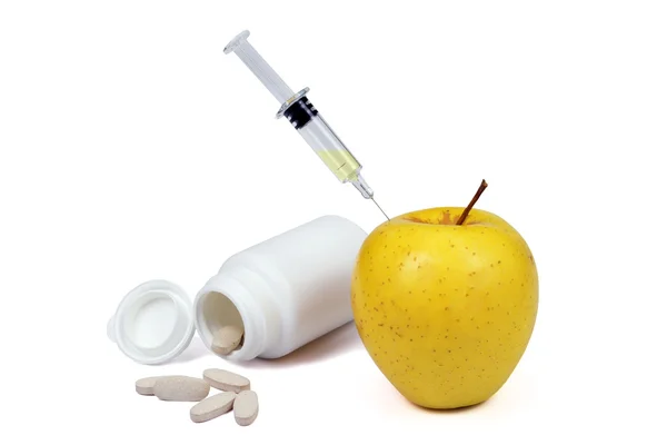 Apple syringe and vitamins — Stock Photo, Image