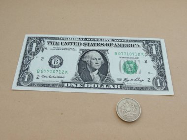 Bize doları banknot - ilk bize Başkan 1789-97 featuring bir dolarlık banknot, George Washington ön yüzünde ve bir Gbp Lirası para