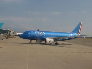 TURIN, ITALY - CIRCA AUGUST 2022: ITA Airways Airbus A319 parked at the airport