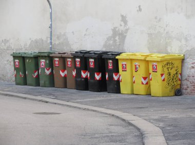 VENICE, ITALY - CIRCA JULY 2022: waste sorting bins for ecological recycling of materials such as glass paper cans