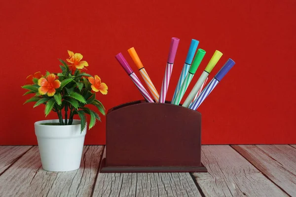 Colored Pens Potted Flower Table — Stock Photo, Image