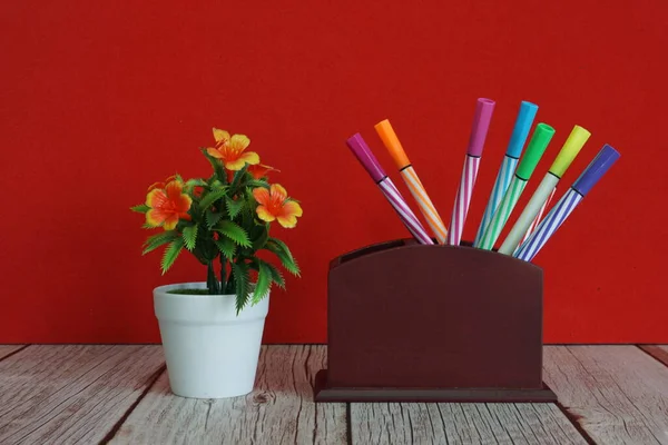 Colored Pens Potted Flower Table —  Fotos de Stock