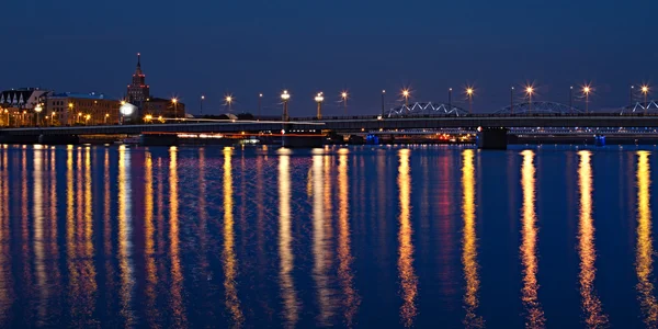 Panoramic view of illuminated bridge in Riga — Stock Photo, Image