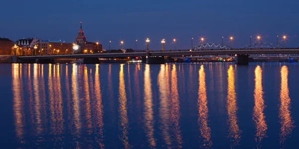 Panorama of illuminated bridge in Riga — Stock Photo, Image
