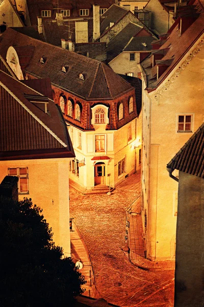 Vintage style photo of old European town at night — Stock Photo, Image
