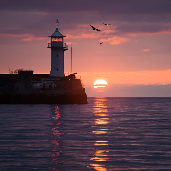 Lighthouse on sunrise — Stock Photo, Image