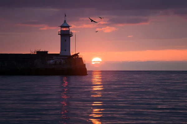Lighthouse on sunrise — Stock Photo, Image