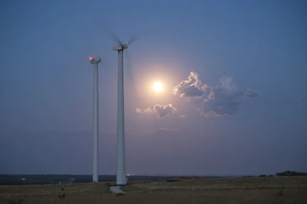 Wind station turbines and full moon at the sky — Stock Photo, Image