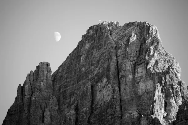 Black and white image of moon in Dolomites — Stock Photo, Image
