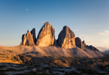 Panorama of Tre Cime at sunny sunset clipart