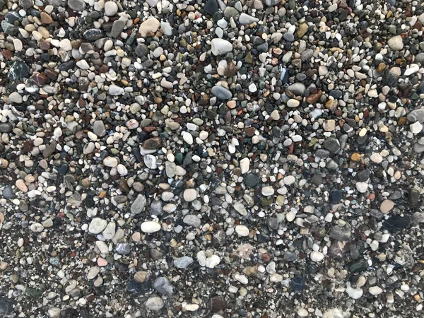 Абстрактный Фон Сухими Круглыми Риблевыми Камнями — стоковое фото
