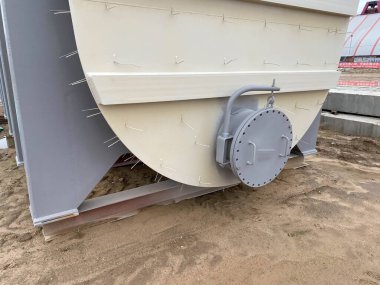 Huge oil, gas and liquid storage tanks in open air field at factory.