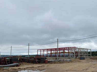Industrial background, bridge construction, scaffolding.